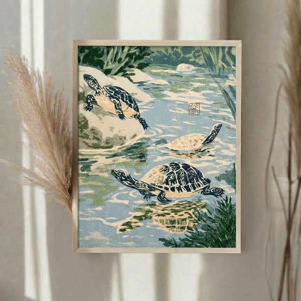 Framed Japandi poster showcasing tranquil turtles in water with reeds and pond vegetation, executed in traditional woodblock style with navy, ochre, and soft green palette.