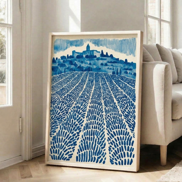Minimalist pastoral scene depicting billowing lavender crops beneath an expansive sky, featuring a village church among rolling hills in muted blue and cream hues.