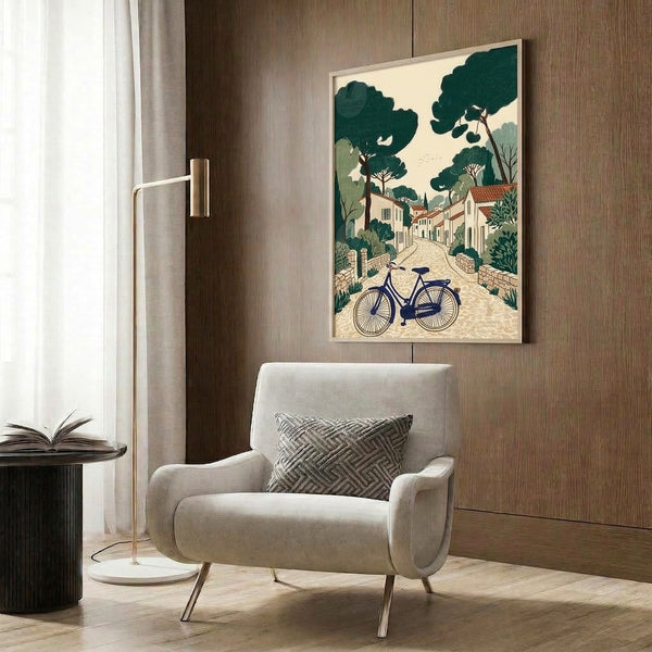 Peaceful village street poster featuring a bicycle with nostalgic retro styling, soft sage and navy tones complementing warm terracotta buildings and natural elements.