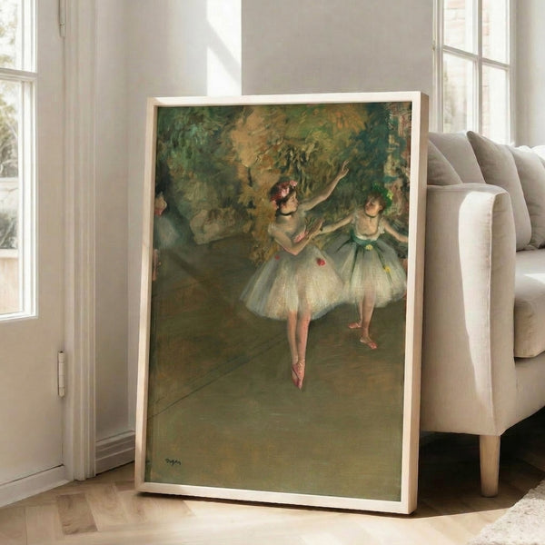 Two graceful performers in ballet costumes displayed as a framed print, featuring impressionist technique with gentle, understated color palette.