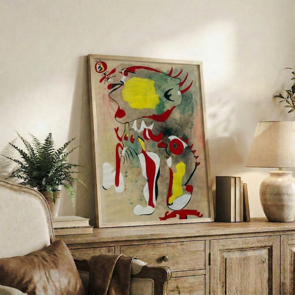 Surrealist wall poster with two abstract figures and a dragonfly rendered in organic shapes and a restrained color scheme of warm and cool tones.
