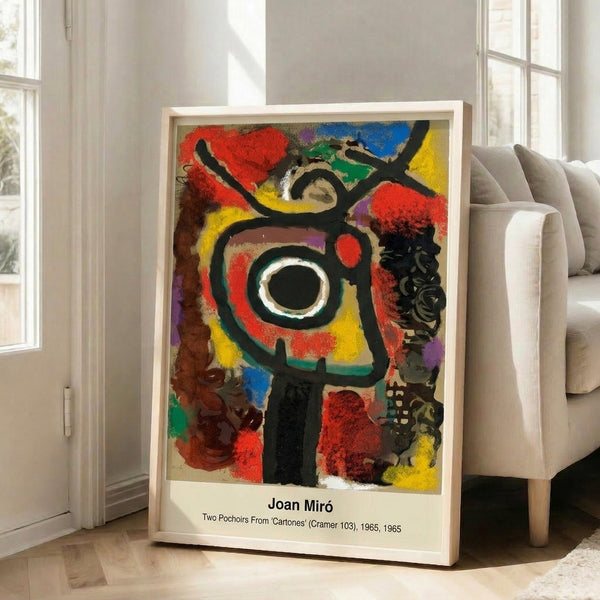 Framed abstract print with whimsical surrealist imagery in black, ochre, and cream tones, featuring spontaneous organic forms and liberating artistic vision.