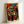 Pochoir art print with bold red and blue abstract motifs and flowing organic lines against a neutral background, characteristic of 1960s avant-garde printmaking.