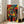 Abstract wall art featuring interlocking biomorphic shapes in vibrant primary colors and black, creating a dynamic surrealist composition on pale ground.