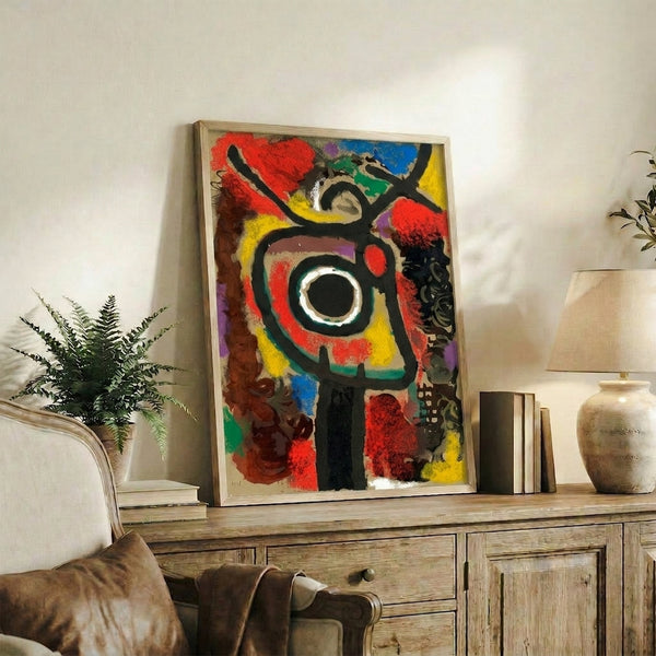Framed modernist print with whimsical abstract forms in red, blue, and black ink, showcasing the playful approach of classic pochoir technique.