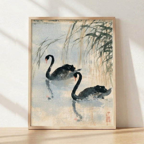 Japanese ink wash painting of a black swan on water with willow branches, rendered in minimalist style with black, gray, and pale blue tones on cream background, framed as wall art.
