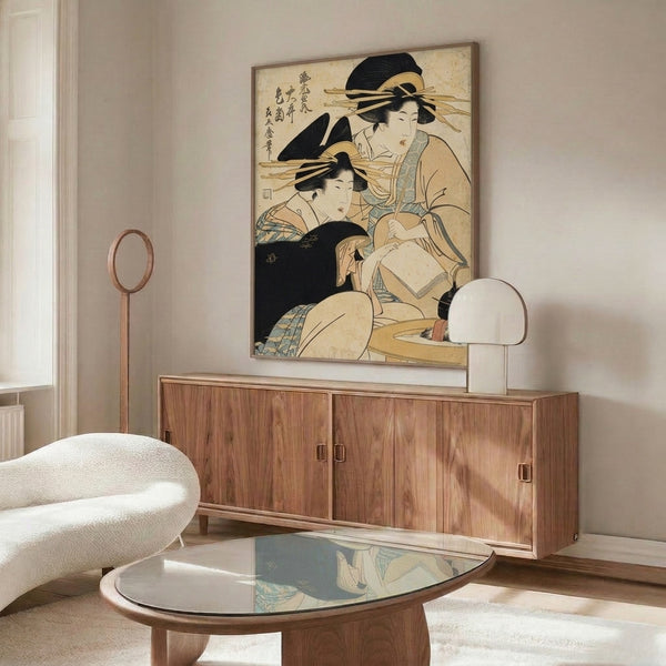 Framed Edo period inspired print of two geishas and a kettle in kimono, combining contemplative elegance with warm terracotta and cool blue tones in authentic woodblock style.