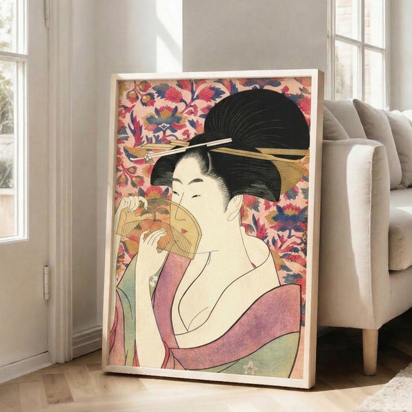 Elegant composition of a kimono-clad geisha holding fan and flowers, executed in traditional woodblock technique with harmonious blush, navy, and gold coloring.
