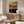 Contemporary minimalist wall art featuring abstract bird and celestial imagery in restrained color scheme with expressive mark-making.