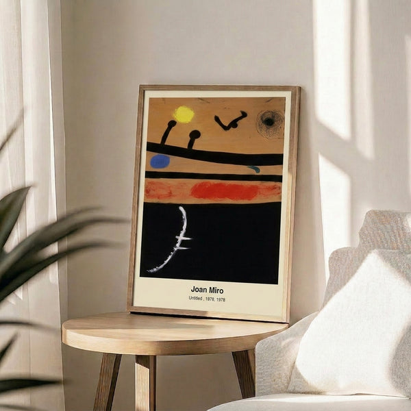 Abstract wall art featuring whimsical surrealist imagery—playful figures and signs—rendered in bold primary reds, blues, yellows, and black lines on white.