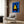 Abstract blue figural form constructed from simplified geometric and organic shapes, wall-mounted contemporary art poster.