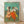 Impressionist ballet dancers artwork featuring figures in vibrant red and yellow skirts, framed poster with loose gestural brushwork and soft pastel tones.