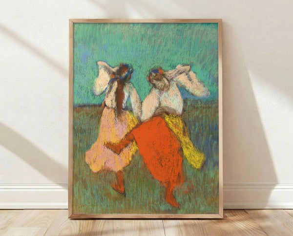 Impressionist ballet dancers artwork featuring figures in vibrant red and yellow skirts, framed poster with loose gestural brushwork and soft pastel tones.