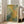 Classical impressionist floral poster showing dense flowering bushes with soft color transitions and dreamy garden mood.