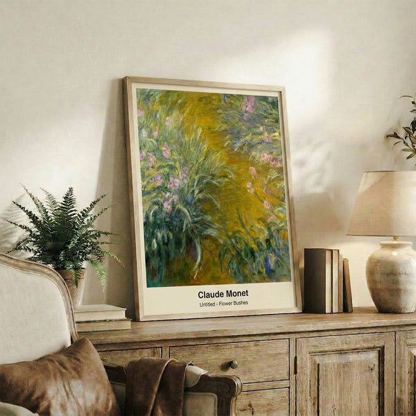 Vintage Impressionist garden scene with blooming flower bushes and poplar trees in muted greens, whites, and blue-green hues, displayed as a framed poster.