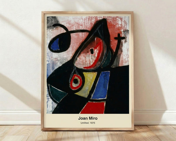 Abstract surrealist poster print featuring playful geometric shapes in red, blue, yellow, black, and white on a framed wall display.