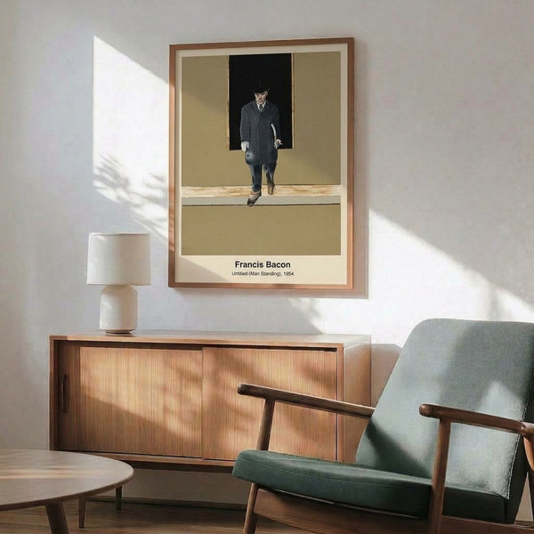 Poster art of a distorted standing man rendered in somber creams, grays, and blacks with rust highlights, expressing existential isolation through abstraction.
