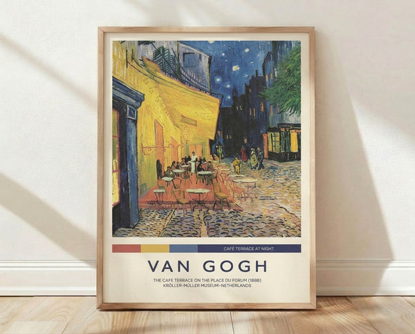 Van Gogh's Cafe Terrace at Night, an Impressionist masterpiece featuring a glowing yellow café with diners on a starlit Parisian street, framed and hung on a wall.