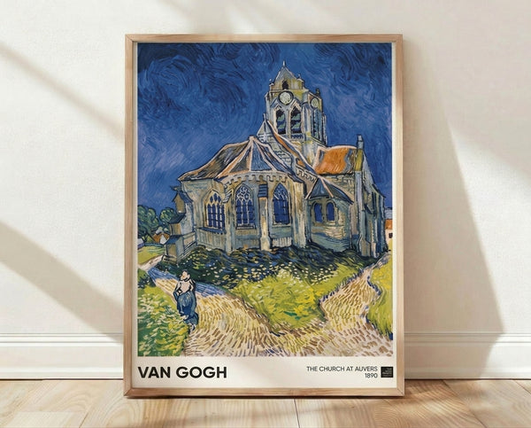 Van Gogh's Church at Auvers framed poster featuring an imposing stone church with a peaked steeple against a swirling blue sky, rendered in bold impressionist brushstrokes with golden and cream accents.