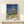 Vintage impressionist poster of a French church rendered with passionate, swirling strokes in blues, golds, and creams, evoking a sense of spiritual contemplation and movement.