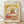 Impressionist painting of a long asylum corridor with arched ceiling receding into perspective, rendered in golden yellows, creams, and soft grays, evoking a contemplative and quietly unsettling mood.