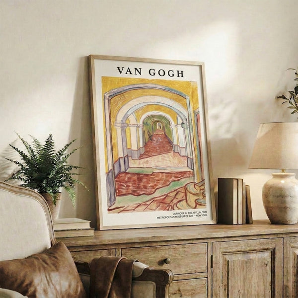 Framed poster of a long architectural corridor with atmospheric perspective, rendered in muted terracotta, cream, and soft lavender tones with a distinctly contemplative character.