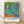 Van Gogh's Irises framed poster featuring vibrant purple and blue iris blooms with swirling brushstrokes in Impressionist style, displayed as wall art in a serene garden-inspired aesthetic.