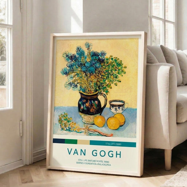 Vibrant still life print of garden flowers bursting from a ceramic vase with scattered citrus fruit and tableware, executed in the expressive impressionist technique with cream and forest green accents.