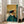 Charming impressionist cat portrait featuring rust red, cream, and forest green hues, depicting a hatted feline with bandage in whimsical yet introspective pose, hung as a framed poster.