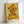 Van Gogh Sunflowers poster displaying luminous pale and golden yellow flowers in a contemplative impressionist style, evoking vintage European artistic mastery.