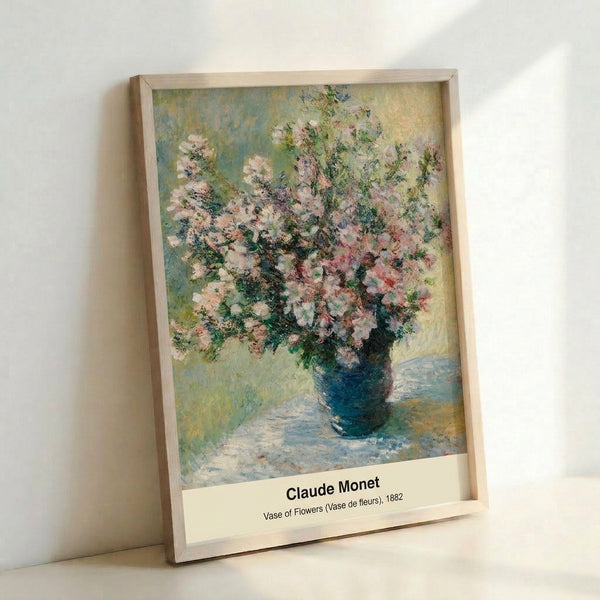 Impressionist watercolor art print depicting a softly rendered vase of flowers in pastel pink and lavender hues with verdant green foliage and warm golden accents.