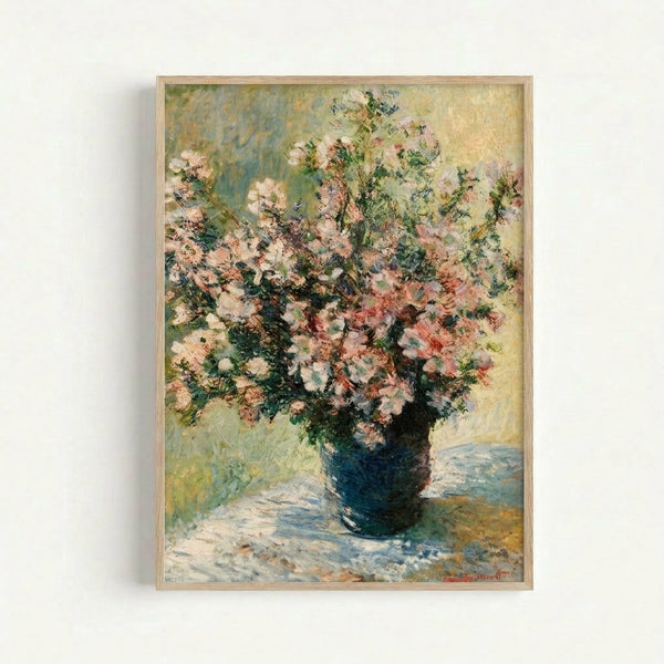 Framed art print of delicate flowers arranged in a vase, rendered in Monet's characteristic impressionist style with gentle brushstrokes and muted colors.