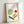 Vintage-inspired boho kitchen poster with simple line art vegetables in cheerful reds, oranges, and greens creating a fresh, homey wall decor aesthetic.