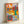Colorful poster art displaying stylized vegetables rendered as flat, interlocking shapes in the distinctive cut-out technique of mid-century modernism.