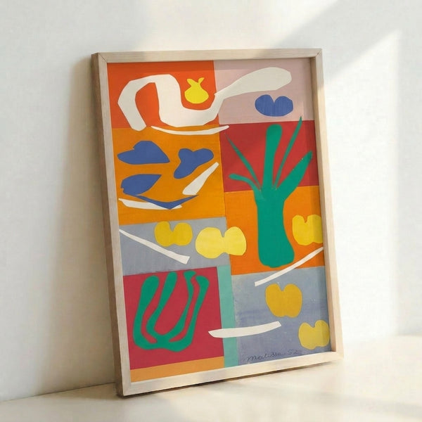 Colorful poster art displaying stylized vegetables rendered as flat, interlocking shapes in the distinctive cut-out technique of mid-century modernism.