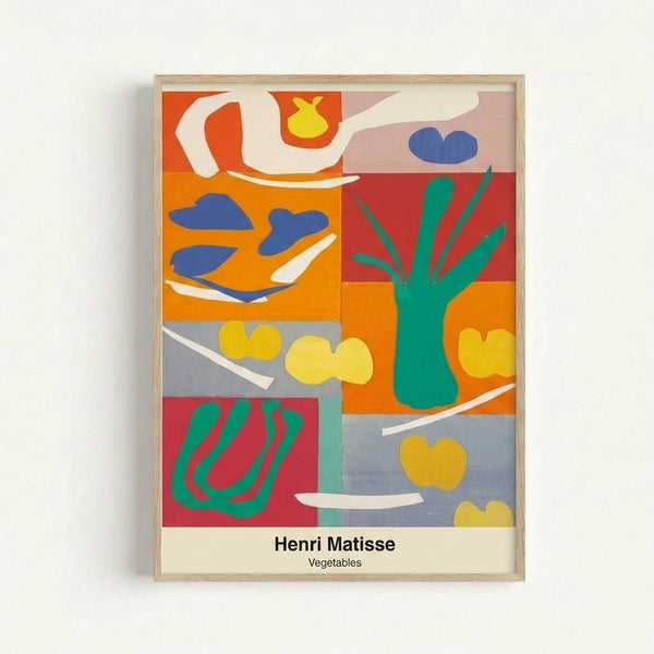 Framed modern art print featuring bold, colorful plant forms in azure, crimson, and emerald against white, celebrating abstract botanical shapes in a decorative cut-out aesthetic.