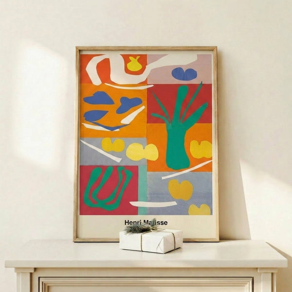 Contemporary framed wall art with playful cut-out vegetable and plant silhouettes in crimson, emerald, ochre, and azure creating an energetic abstract composition.