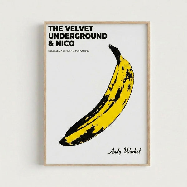 Pop art wall print displaying a simple yellow banana design with striking color contrast, inspired by famous Warhol-style album cover art.