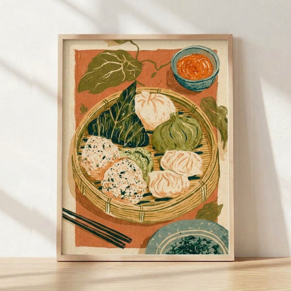 Vintage Art Nouveau illustration of a bamboo steamer basket with dim sum ingredients including garlic, artichoke, and fresh herbs in terracotta orange, sage green, and cream tones, framed poster on wall.