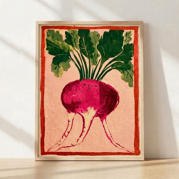 Whimsical folk art print of a smiling beet root with vibrant magenta and rust-red tones, sage green leaves, and cream background; framed poster with cheerful, homey cottagecore charm.