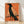 Vintage folk art poster featuring a black crow with ornate floral wings in orange, teal, and cream tones, framed on a wall with a whimsical, nostalgic mood.