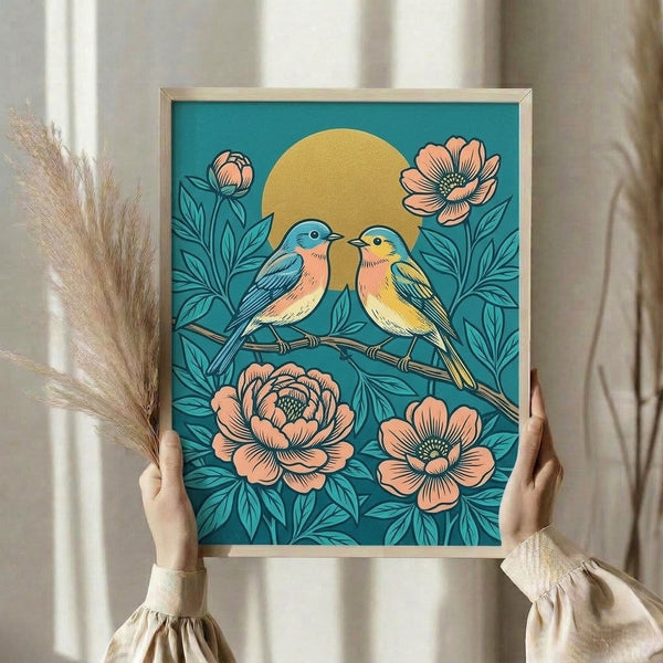 Framed Art Nouveau-style print depicting romantic lovebirds nestled in flowering peonies with a radiant sun overhead, combining nostalgic folk art charm with teal and golden yellow hues.