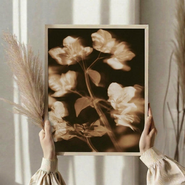Warm sepia botanical illustration of a blooming flower with muted brown and cream tones, painted in a soft impressionist style that conveys quiet, nostalgic elegance.