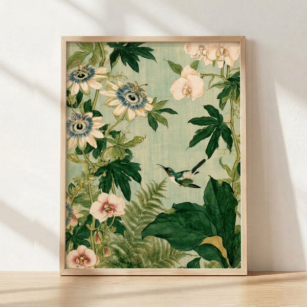 Framed Art Nouveau botanical poster featuring a delicate hummingbird hovering near passionflowers and ferns in sage green, cream, and pale pink tones.