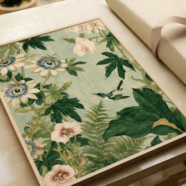 Naturalistic framed poster depicting a graceful hummingbird among passionflowers and ferns rendered in vintage Art Nouveau style with navy blue and sage green accents.