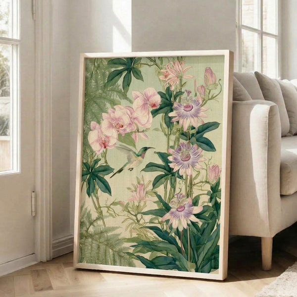 Serene framed art print showcasing a hummingbird hovering near blooming orchids and ferns rendered in muted vintage impressionist style with forest green and blush accents.