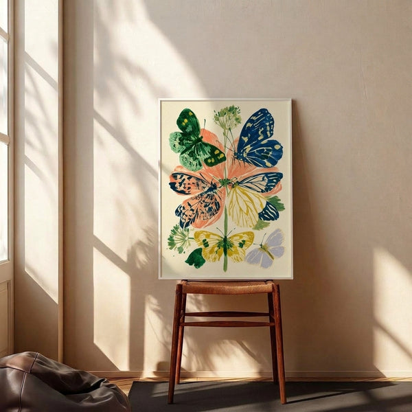 Peaceful watercolor-style poster displaying a monarch butterfly perched on vintage flowers in warm coral and yellow hues with forest green leaves against a cream canvas, framed wall art.