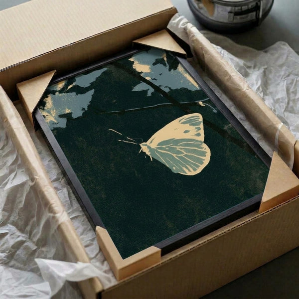 Contemplative nature poster combining a luminous butterfly with deep teal night sky and dark foliage, executed in understated vintage tones and displayed as framed wall decor.