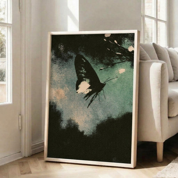 Ethereal moth art print in the style of traditional ukiyo-e, rendered in muted forest green, cream, and charcoal on a soft blue ground, displayed as a framed wall poster.