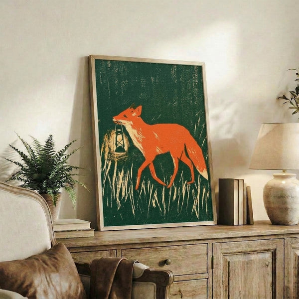 Vintage-inspired folk art poster showing a fox clutching a lantern amid tall grass, featuring warm earthy colors and a rustic, cottagecore aesthetic that evokes quiet wonder and nature.